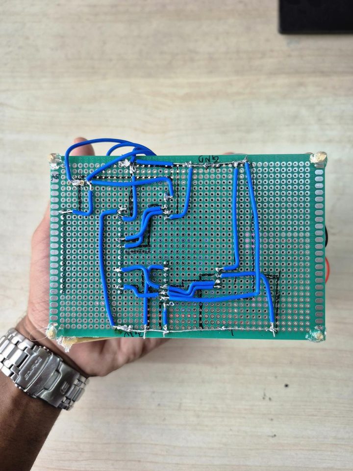 Hand-soldered point-to-point wiring on the underside of the sensor deck